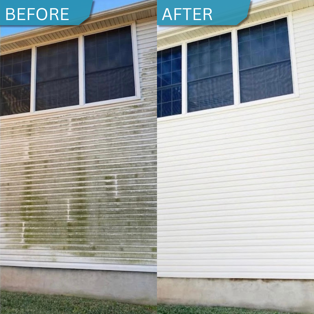 Apartment building with three floors, beige siding, and white balconies and railings. There is a sliding glass door and a glass door on the ground level, with a potted plant nearby.