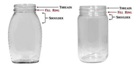 Two empty glass jars with labeled parts: fill ring, shoulder, and threads.