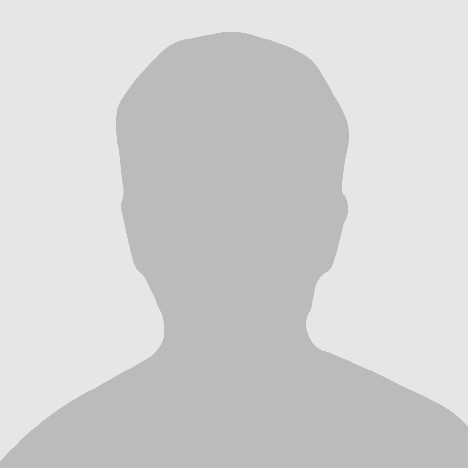Silhouette of a person's head and shoulders in grayscale