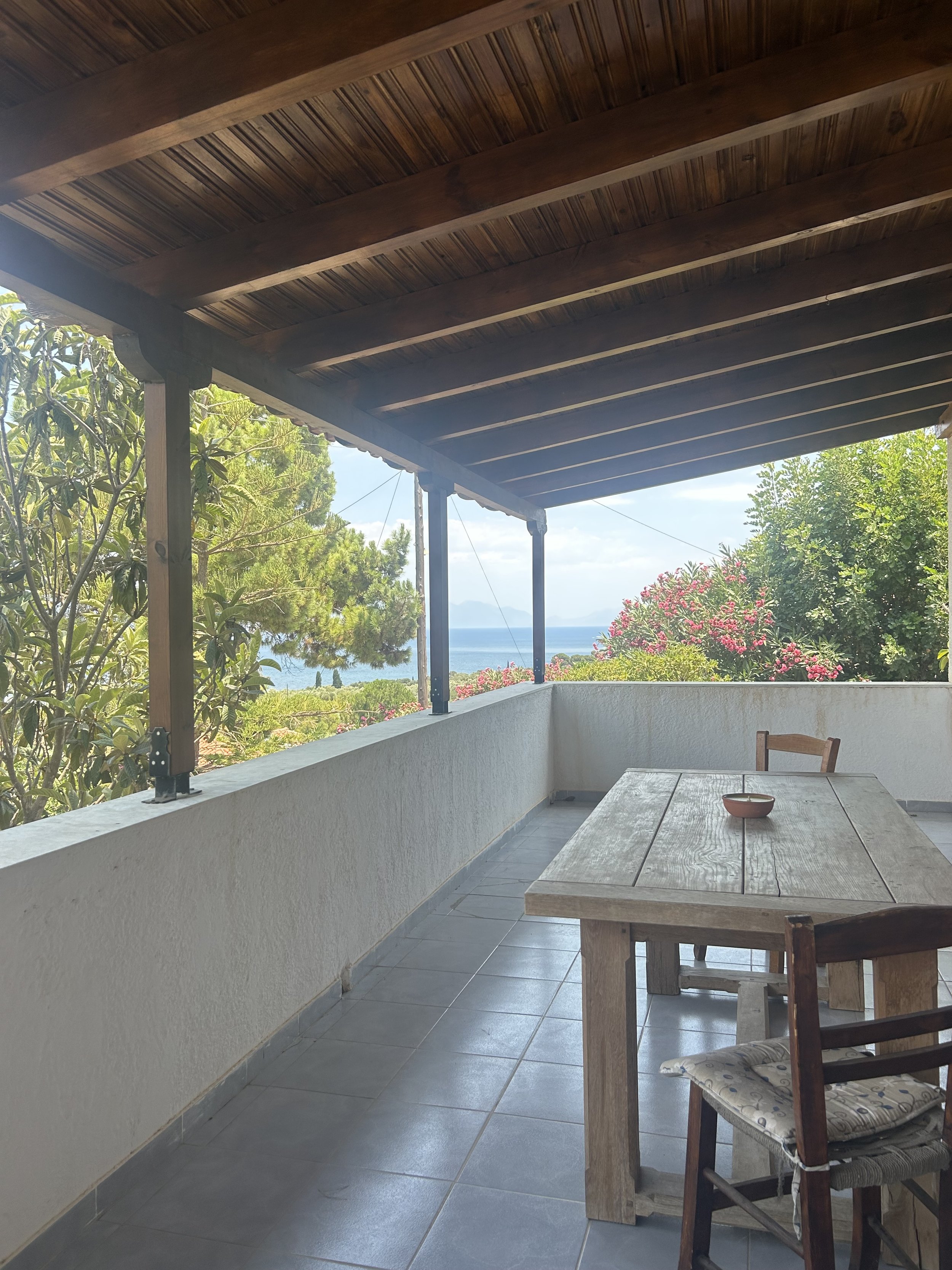 Villa Mystras self-catering villa Greece – terrace with outdoor dining and panoramic sea views