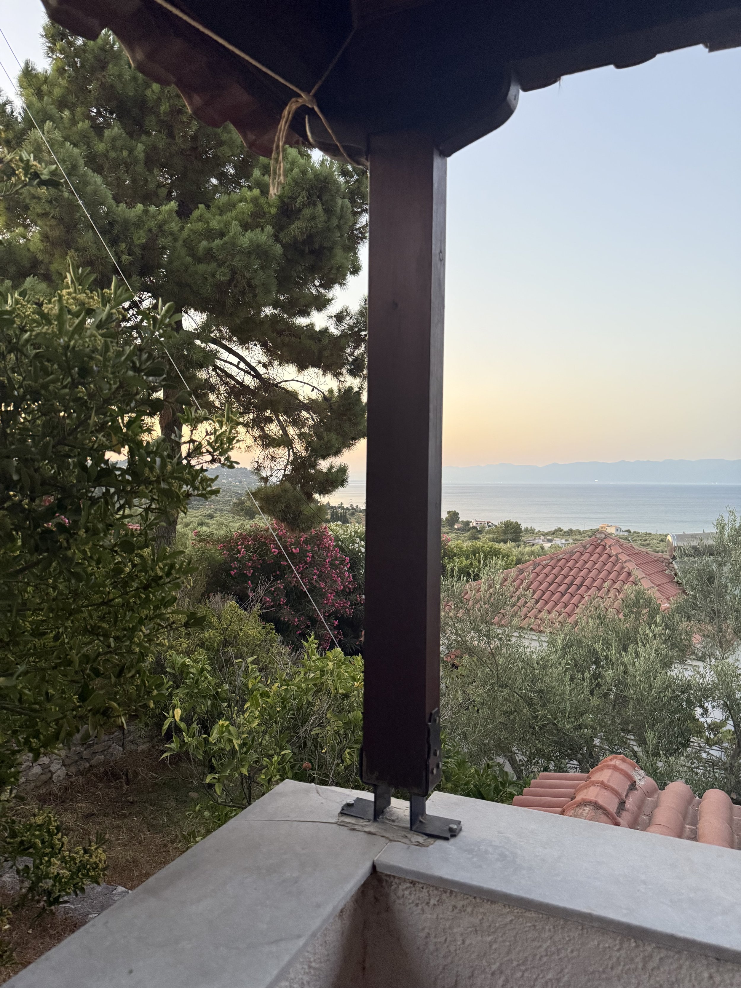 Sunset sea views from a holiday villa in Messinia – private balcony at Saint Friday Villas, southern Peloponnese Greece