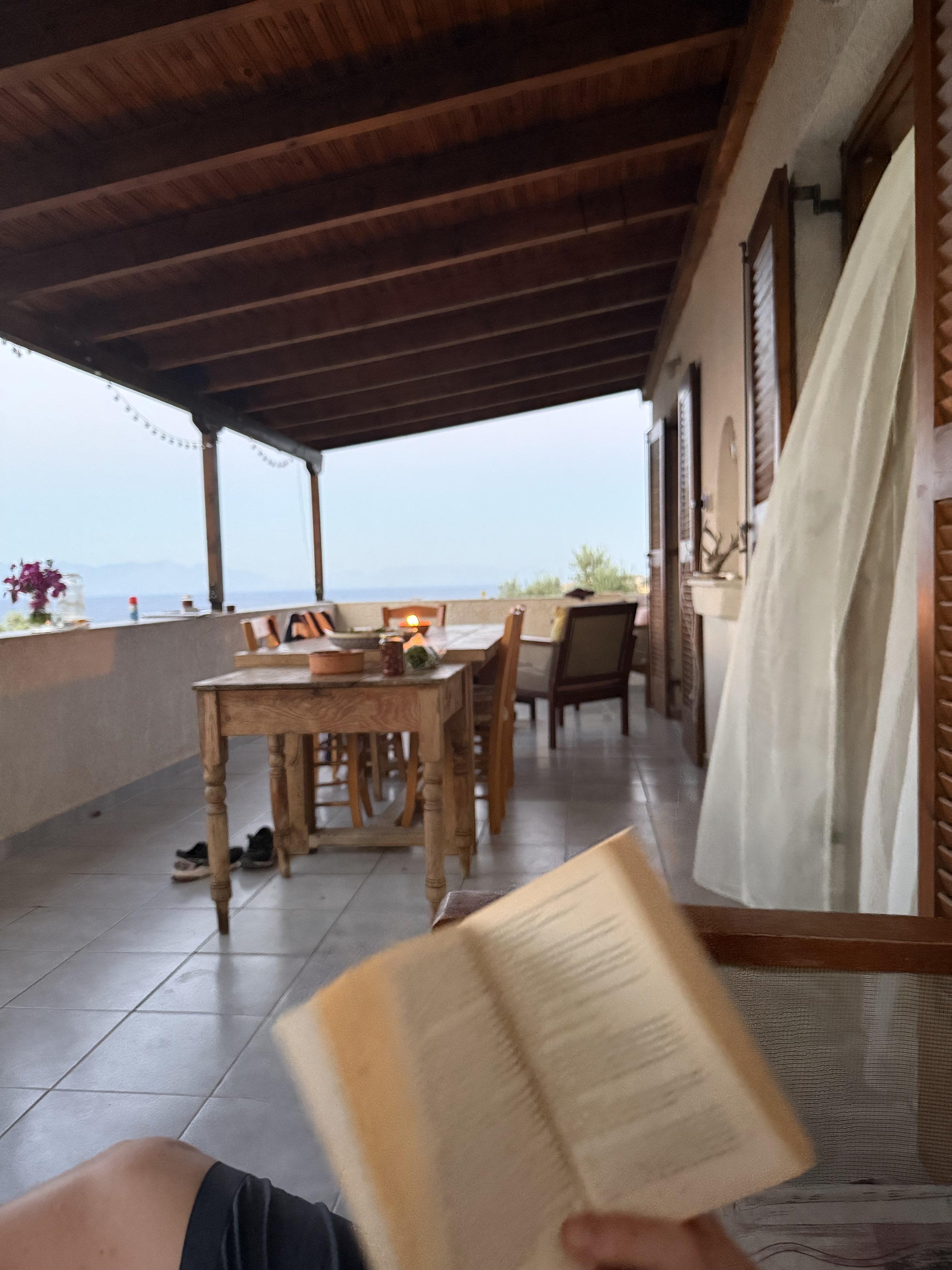 Saint Friday Villas Peloponnese – shaded terrace with wooden beams and panoramic Ionian Sea views, perfect for a slow Greek holiday