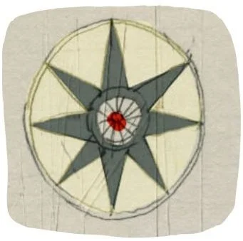 Eine achtzackige Windrose mit einem roten Punkt im Zentrum