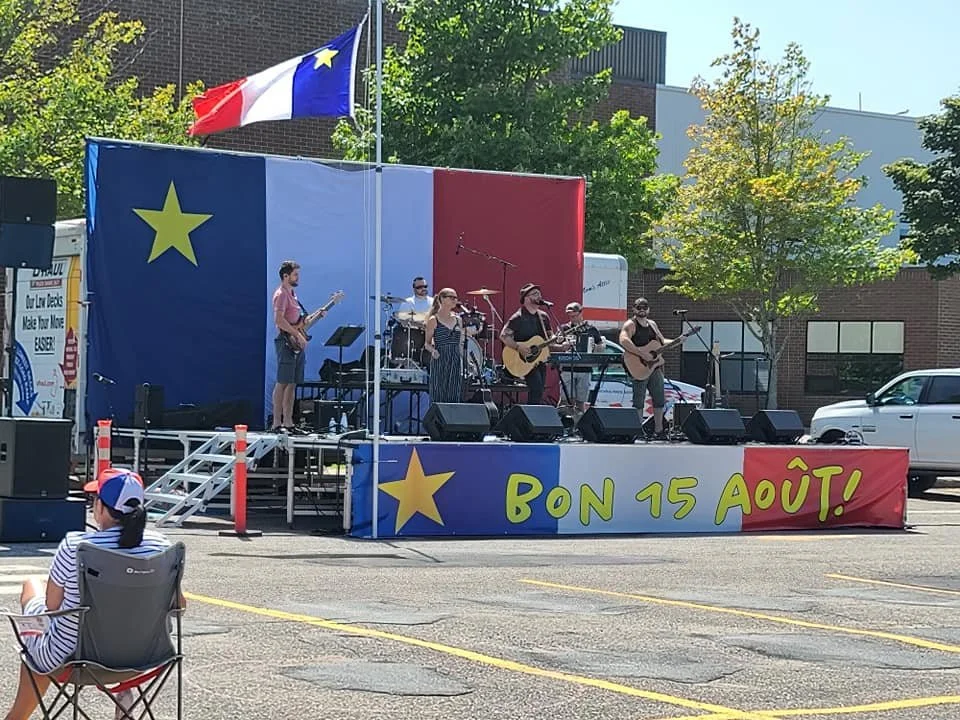 Paula at the Acadian days events listening to some great music. 