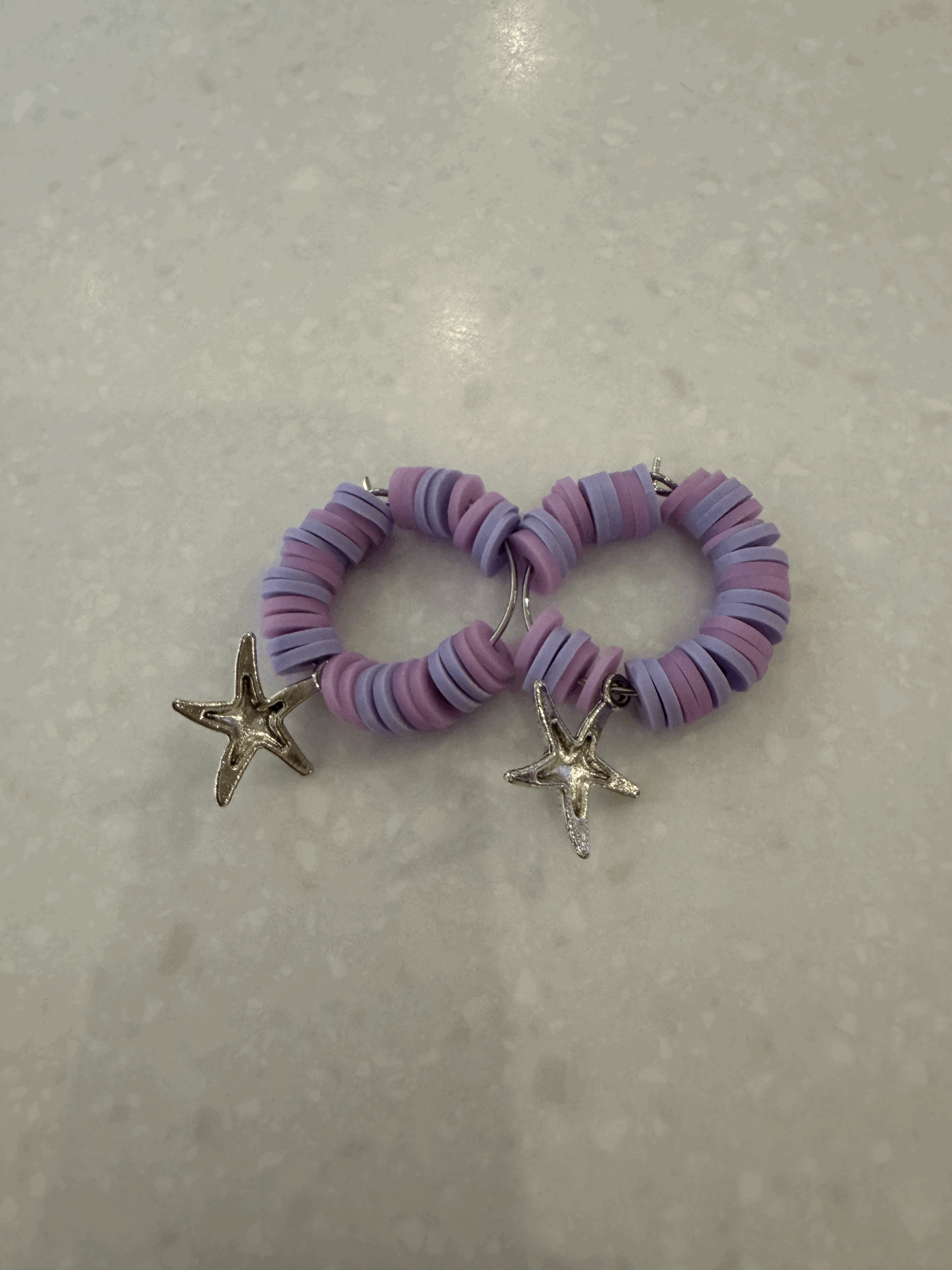 purple pose earrings