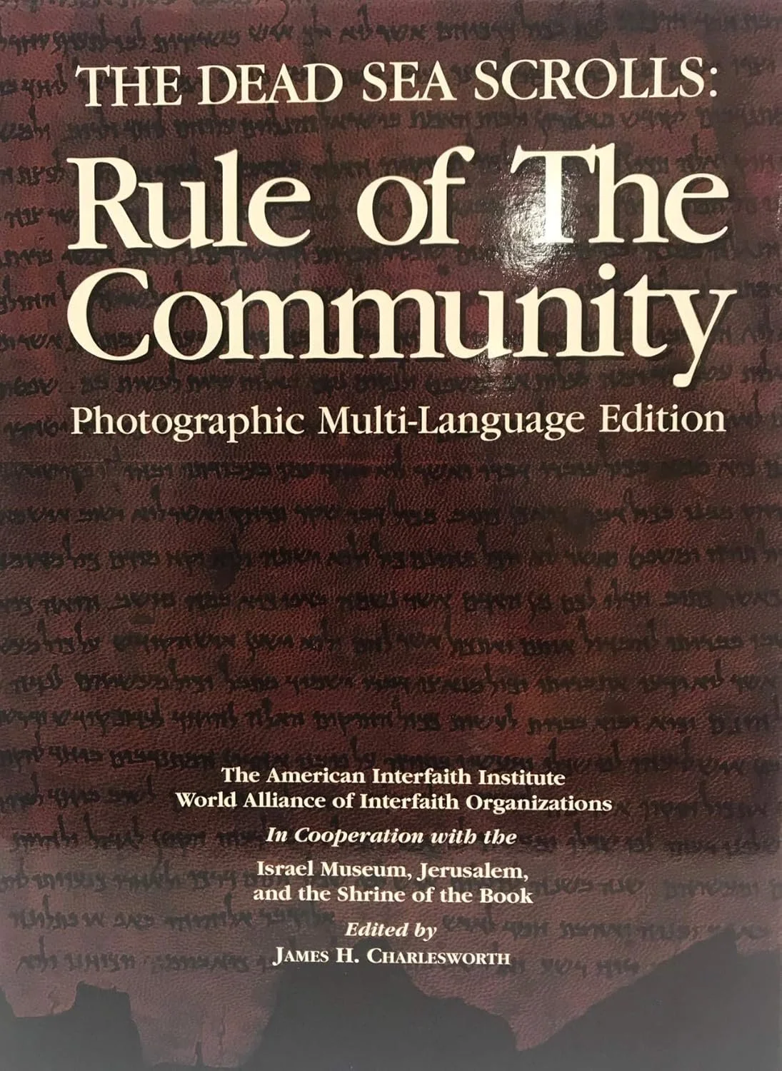 Book cover titled "The Dead Sea Scrolls: Rule of The Community Photographic Multi-Language Edition" with background image of ancient scrolls and text.