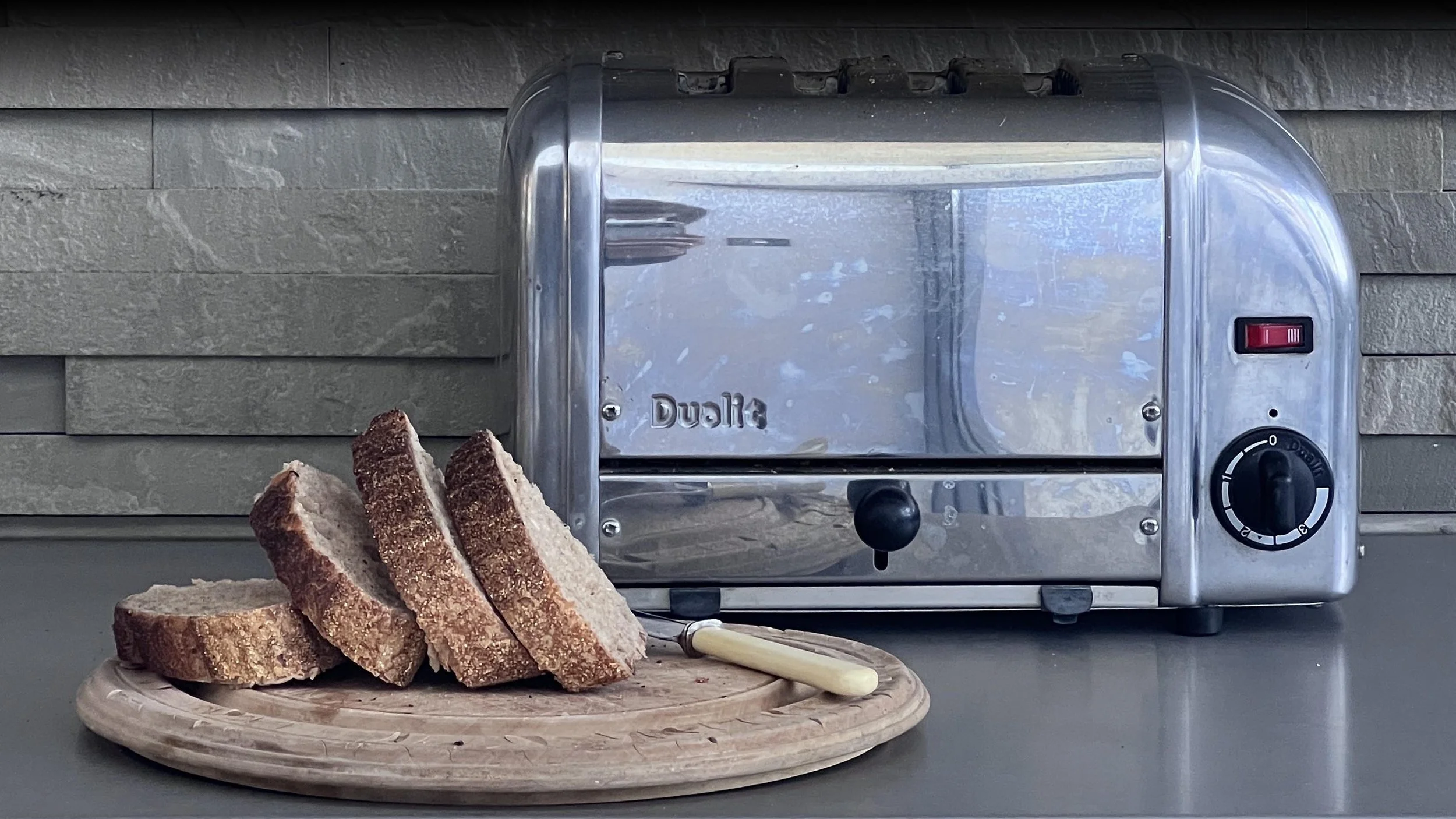Slices of sourdough bread on a wooden cutting board