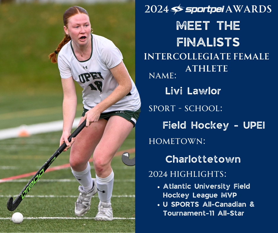 A female field hockey player in mid-action, wearing a white uniform with green accents, number 19, on a green field.