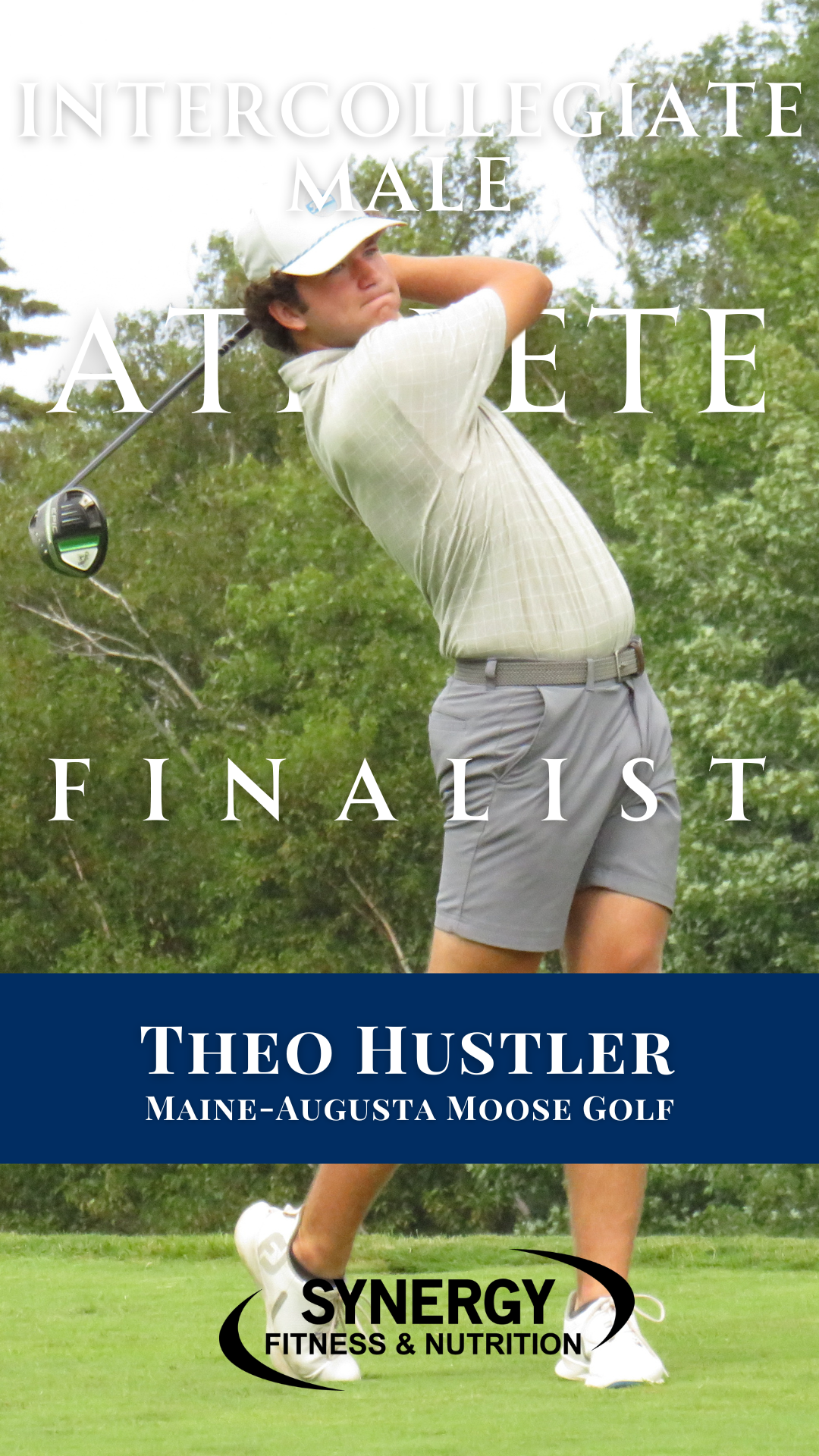 A male golfer swinging a golf club on a golf course, wearing a light-colored shirt, shorts, and a cap, with trees in the background.