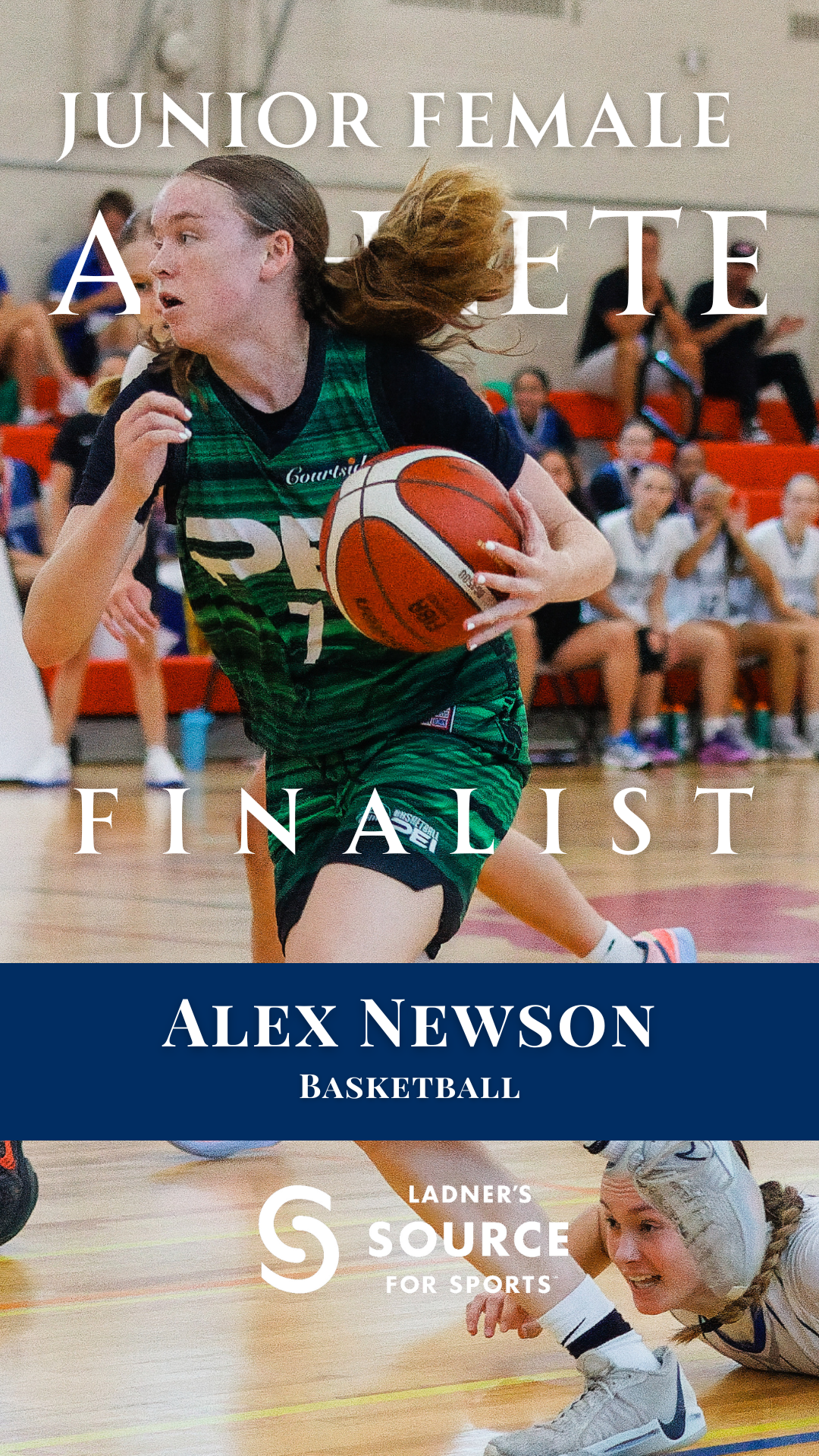Young girl playing basketball during a game. She is running with the ball, wearing a green uniform. The background shows spectators and other players sitting on the bench.