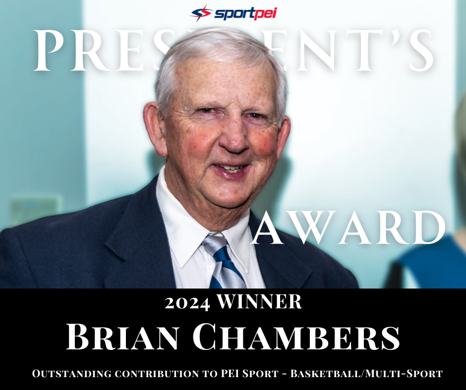 A man in a suit and tie smiling at an award ceremony, with text indicating he is the 2024 winner of the PEI Sport President's Award for Outstanding Contribution to PEI Sport in Basketball/Multi-Sport.