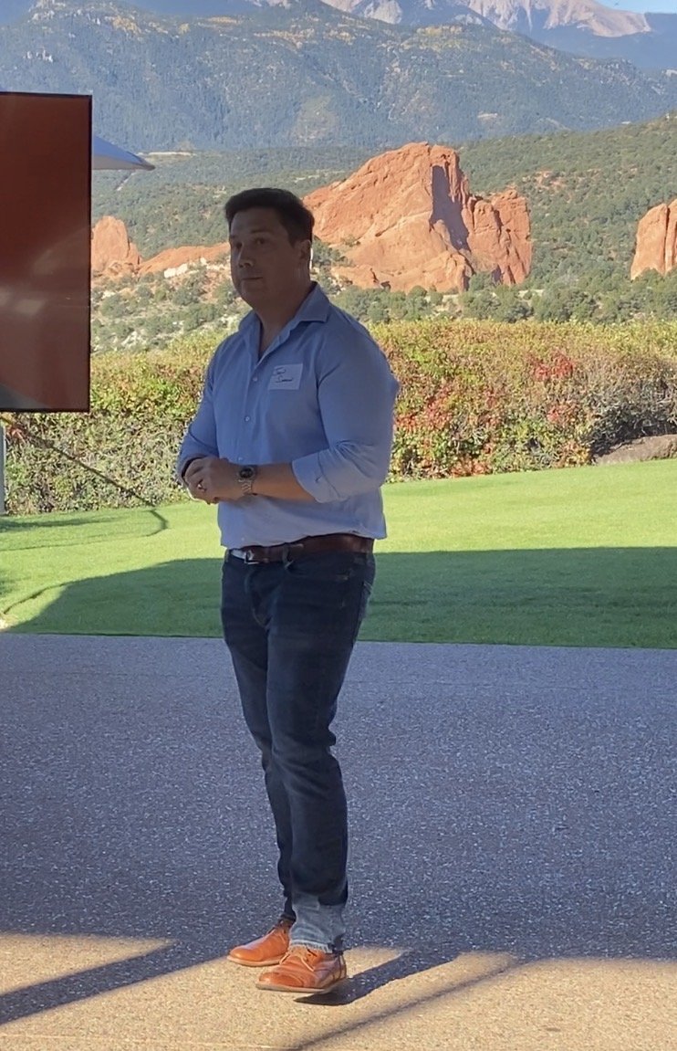 Jason presenting to an audience