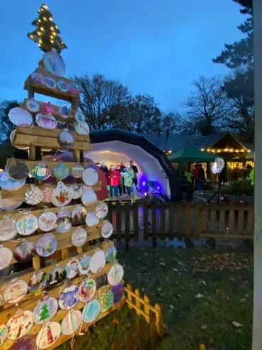 wooden christmas tree and school decorations 2025.webp