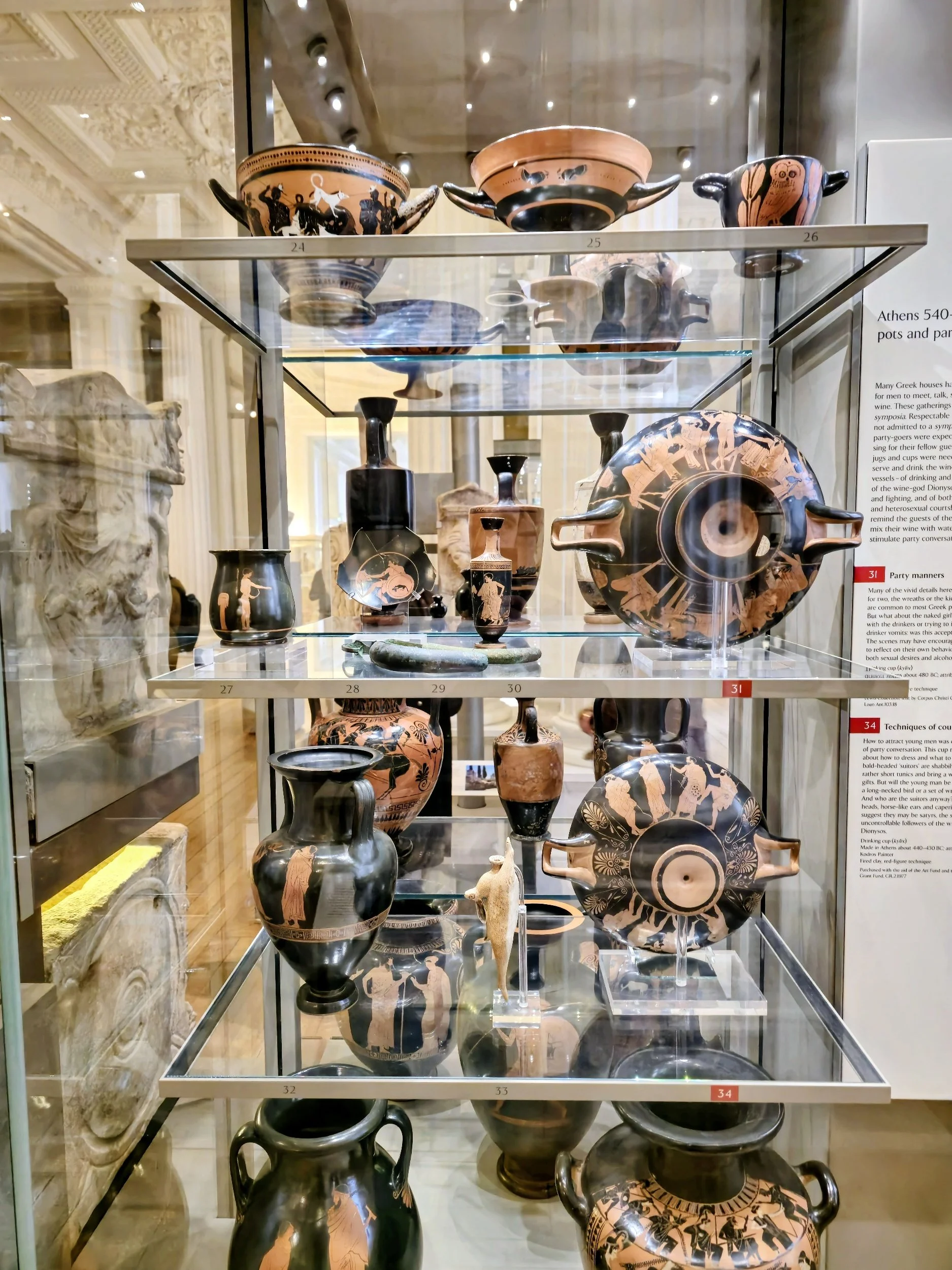 Greek pottery at the Fitzwilliam Museum features intricate black-figure and red-figure designs from ancient Athens.