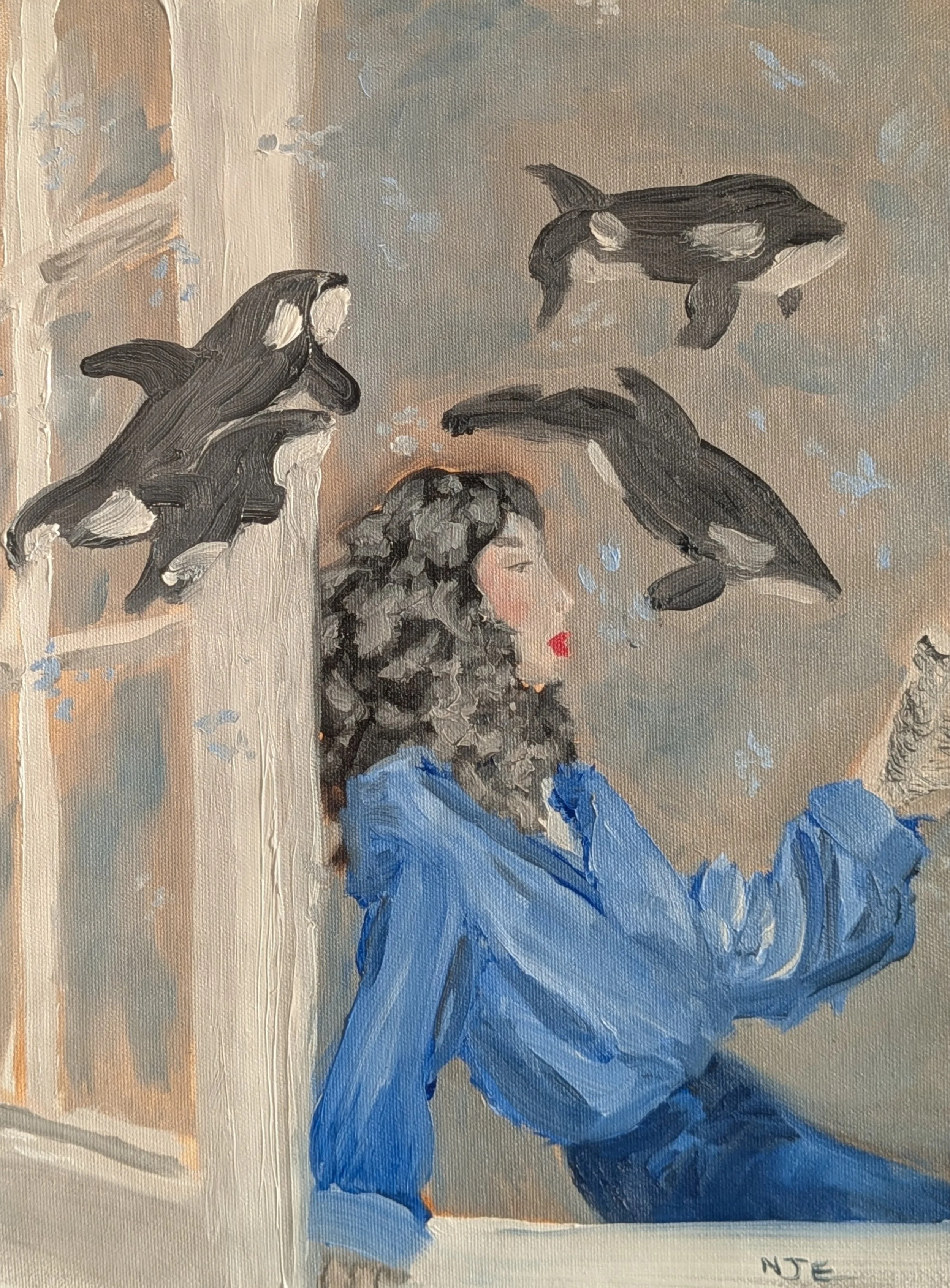 woman reading at a window with orcas swimming over her head