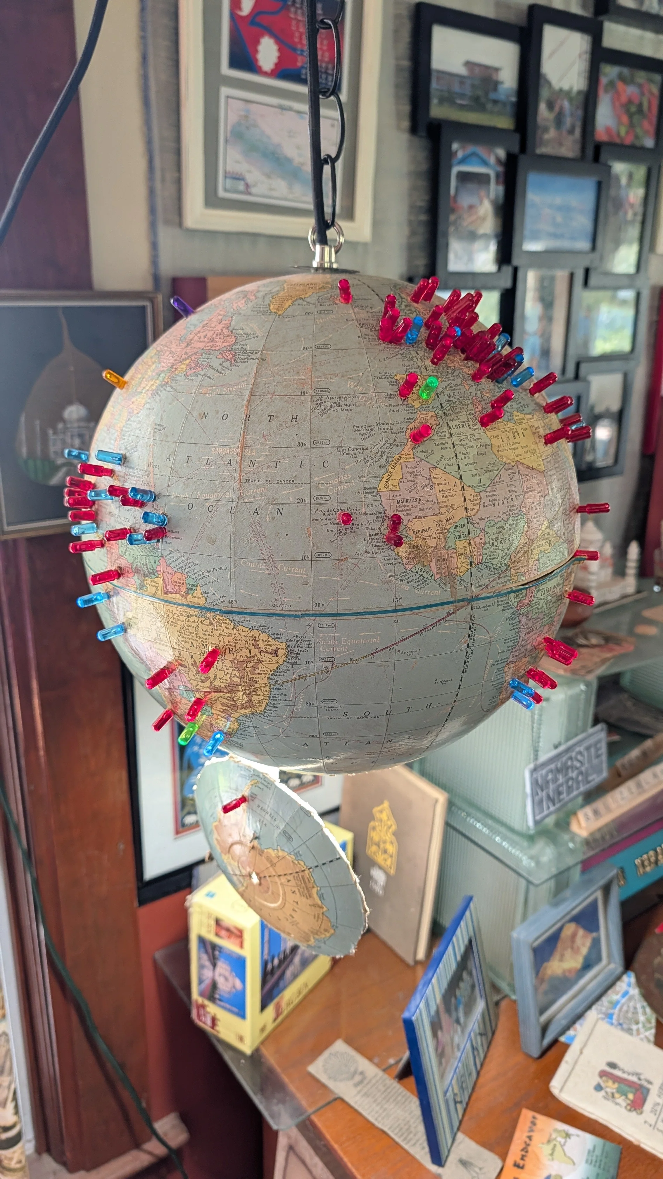 Lite Brite studded globe. Red peg : one visit, blue peg : two visits  Green peg three ( Argentina and India Spain.   Canada Purple I do not know how many times I have been there. 