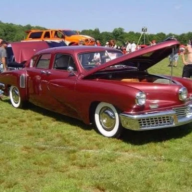 Tucker #51, the last Tucker ever produced. There are 46 left in existence. Recently one sold at Barrett Jackson for $2.9 million. In 1988, Joe Sulpy restored the body for Chick De Lorenzo of Butler, NJ. The car is currently owned by the grandson of P