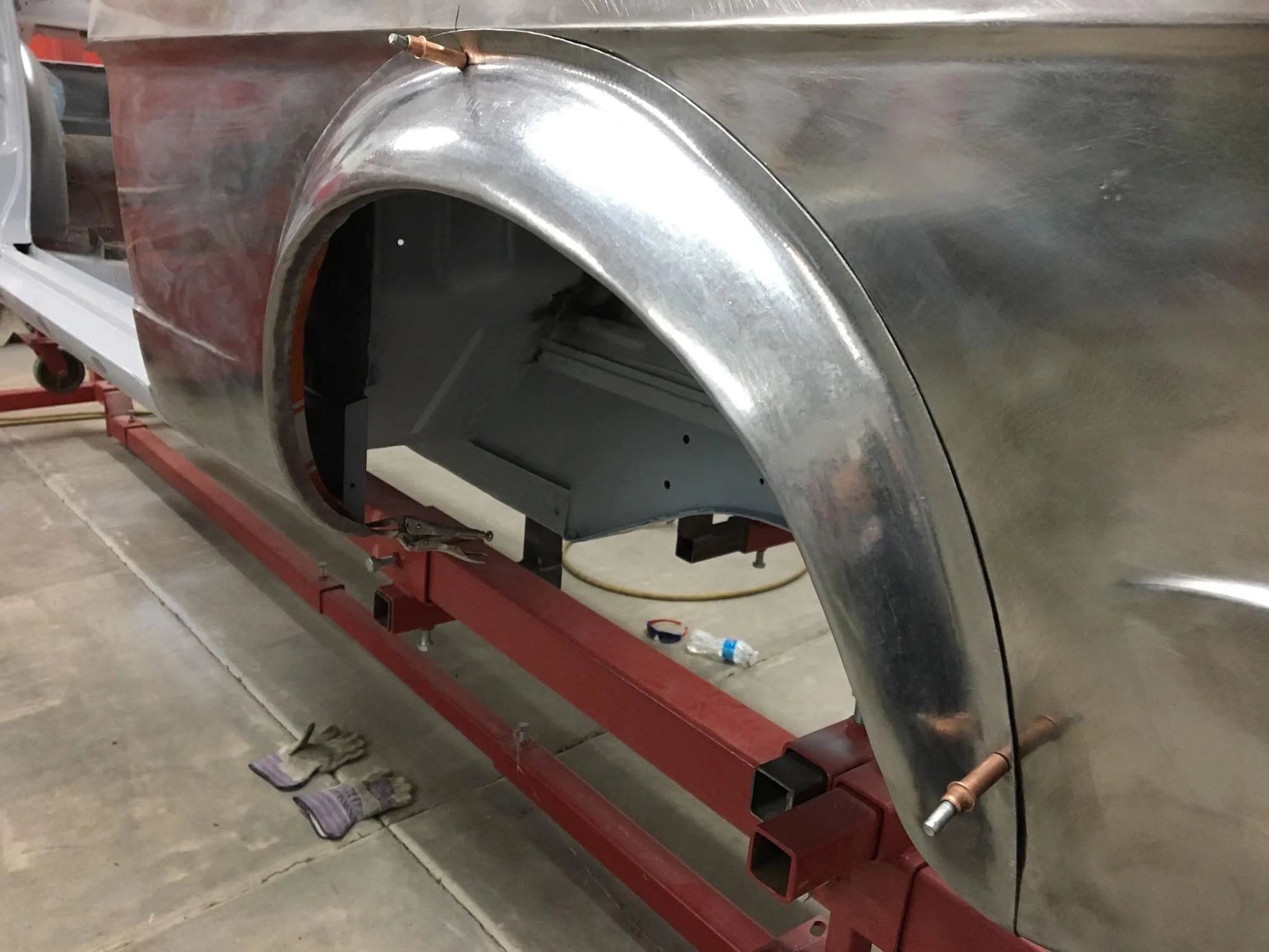 Wheel well flared out. Metal working by Joe Sulpy.