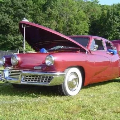 Tucker #51, the last Tucker ever produced. There are 46 left in existence. Recently one sold at Barrett Jackson for $2.9 million. In 1988, Joe Sulpy restored the body for Chick De Lorenzo of Butler, NJ. The car is currently owned by the grandson of P