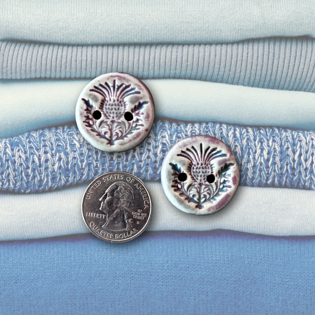 Highland Thistle coin.png