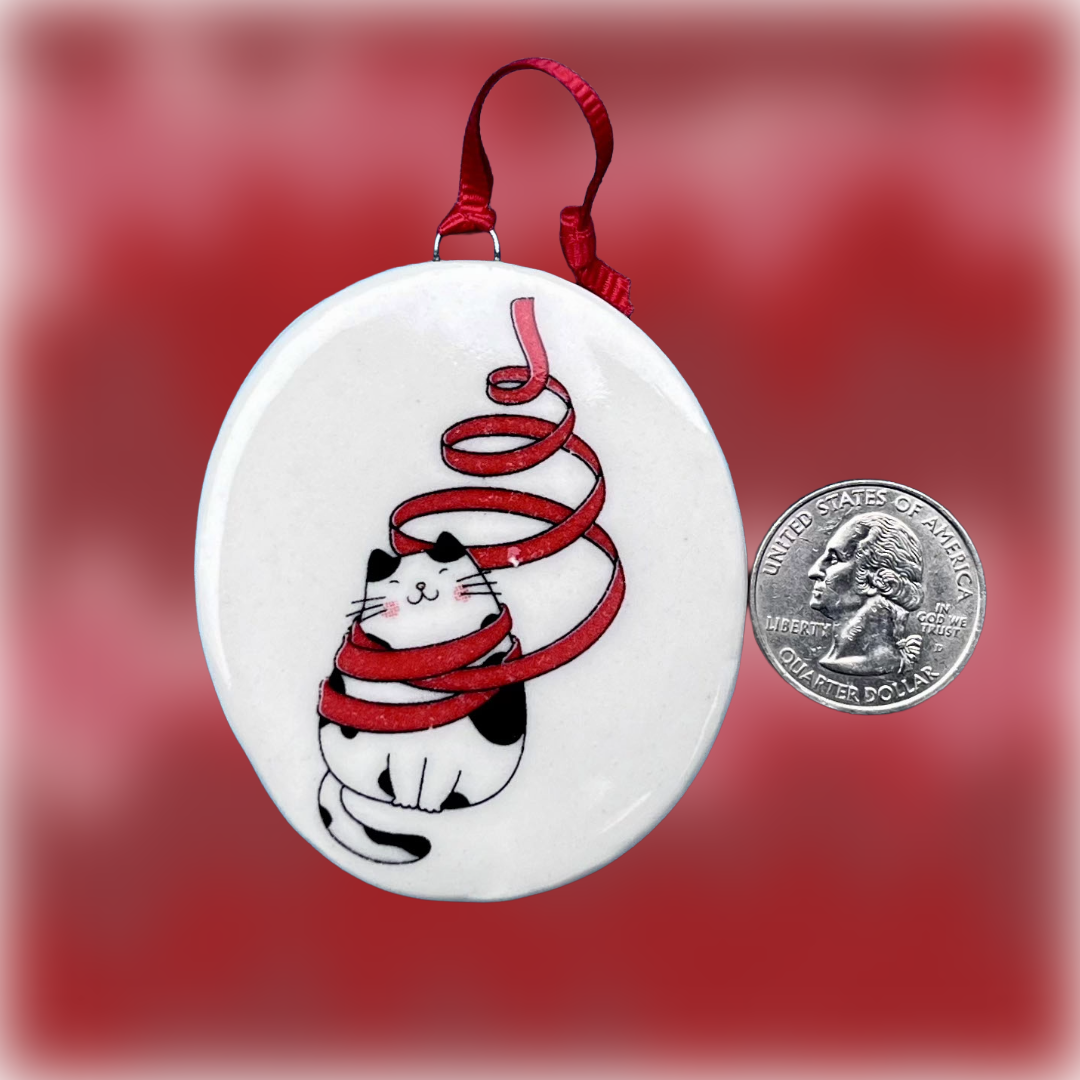 Christmas Cats All Wrapped up 1 coin.png