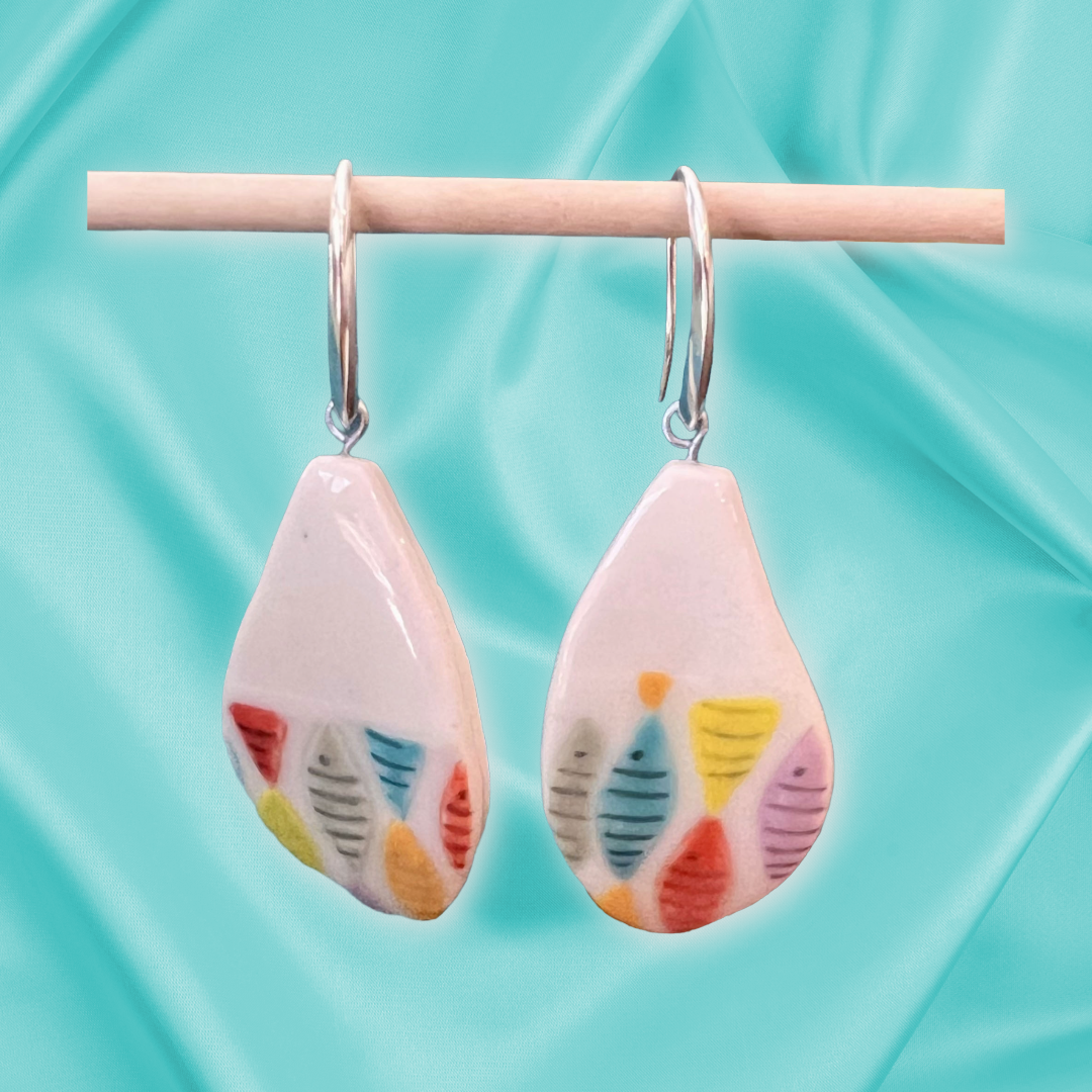 Kaleidoscope Tide Earrings hanging.png