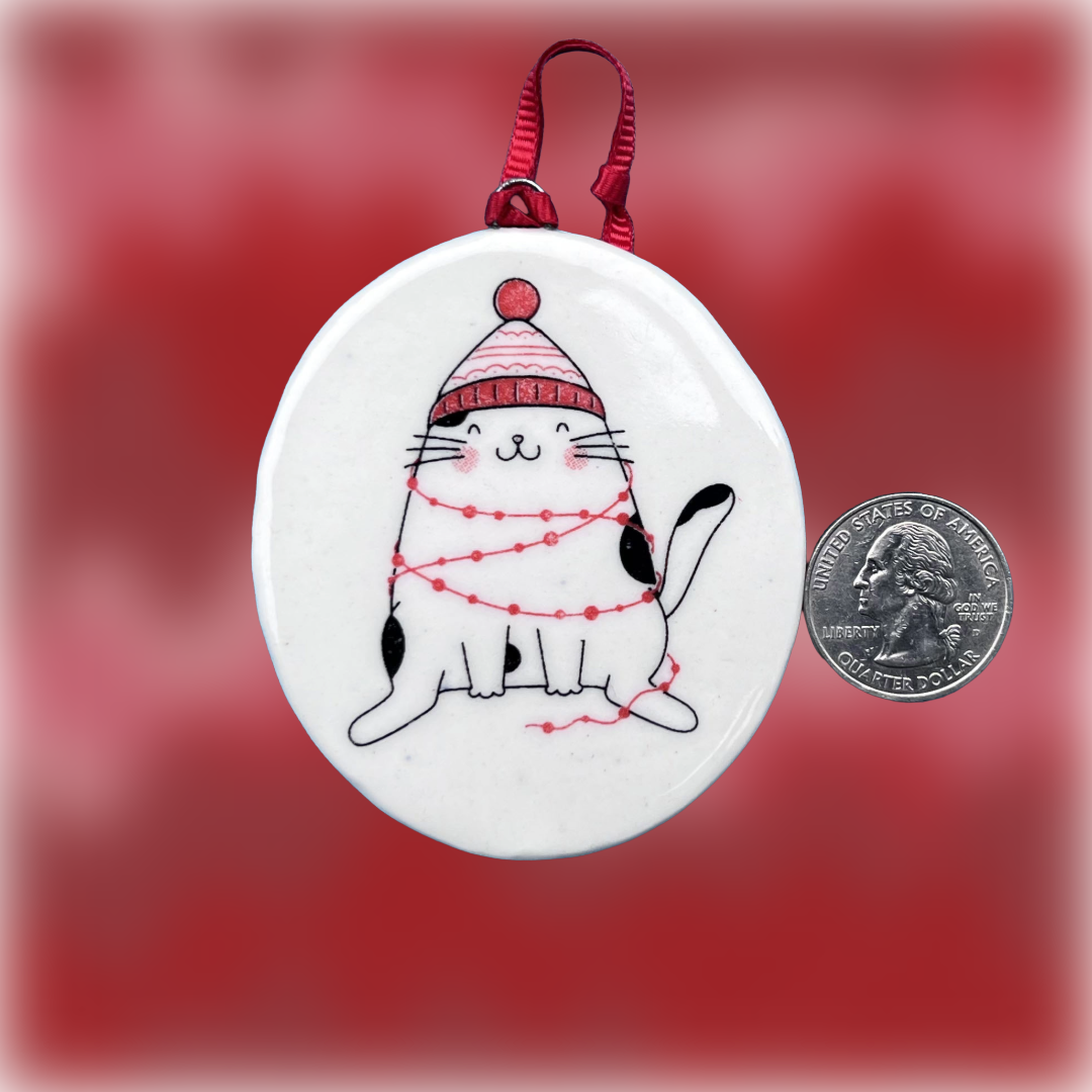 Christmas Cats lightly tangled coin.png
