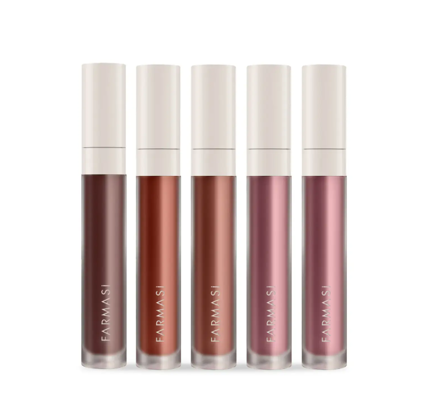 Five tubes of liquid lipstick in various shades from dark brown to pink, with white caps, arranged in a row.