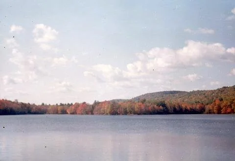 View of lake and mountains in fall color.