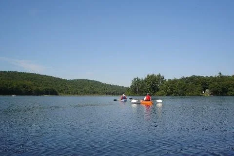 Two people kayaking.