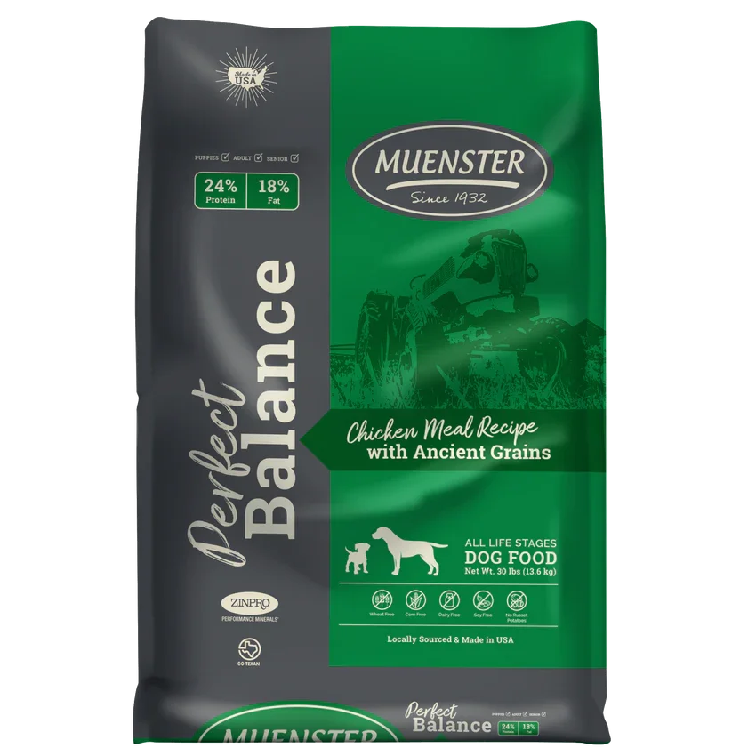 Bag of Muenster dog food labeled 'Chicken Meal Recipe with Ancient Grains,' featuring a silhouette of a dog and a puppy, emphasizing it is suitable for all life stages, and highlighting it is Locally Sourced and Made in USA.