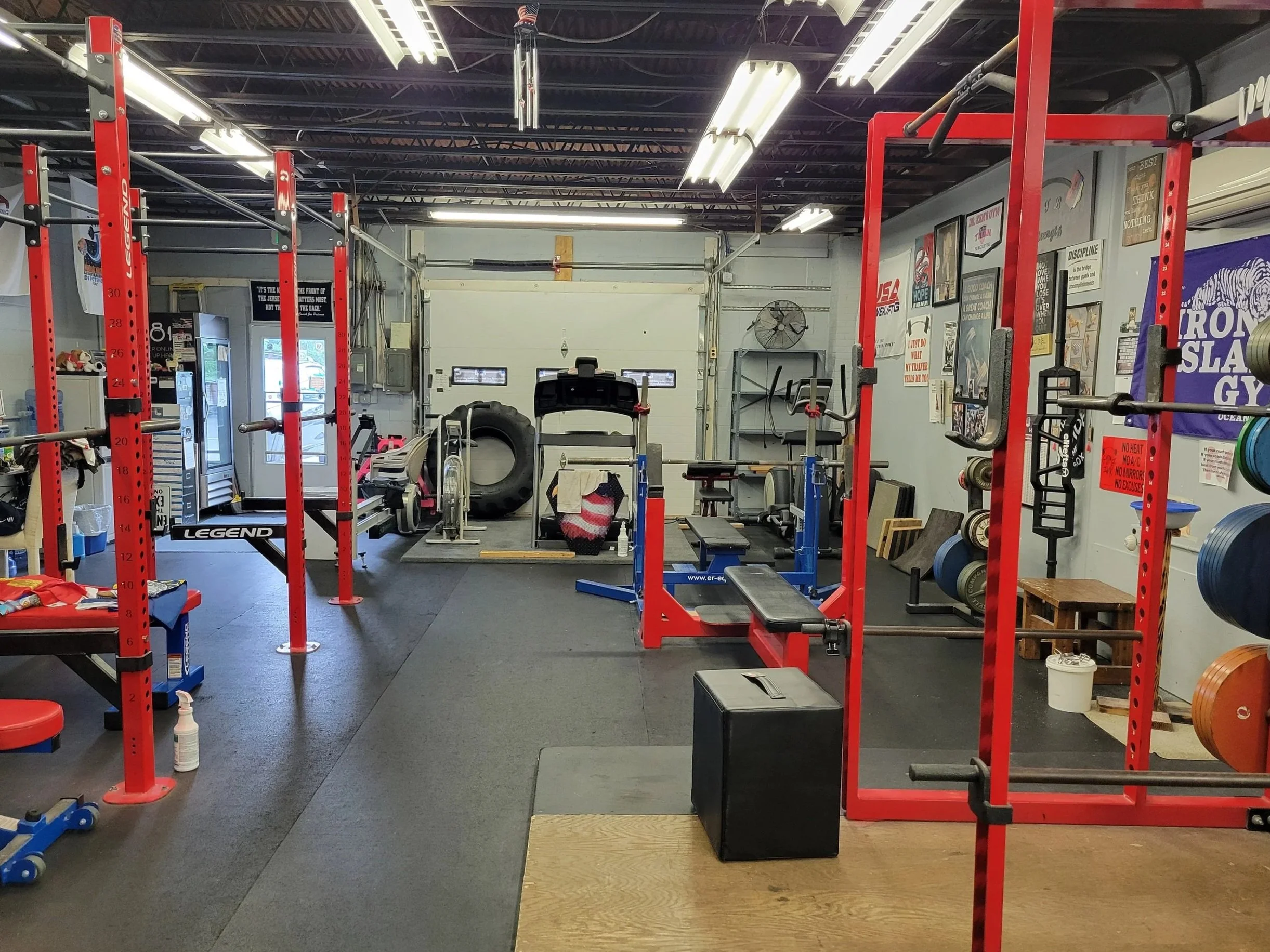 Wide view of OTB Strength gym floor with racks, barbells, and training equipment in Rockville, Maryland.