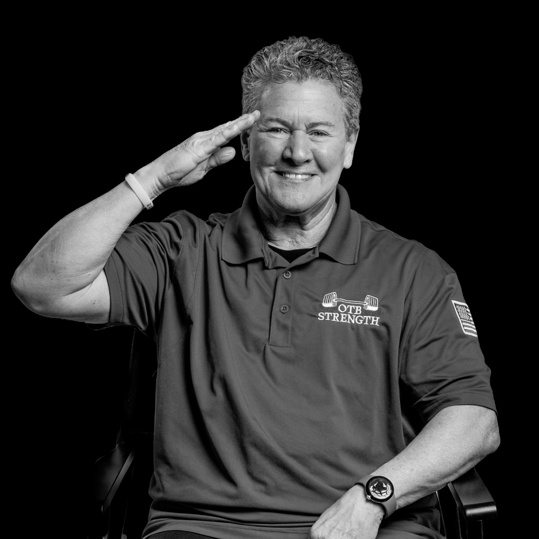 Professional headshot of Coach LJ Belsito.