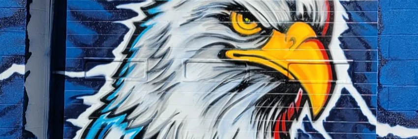 OTB exterior wall mural featuring a stylized bald eagle.