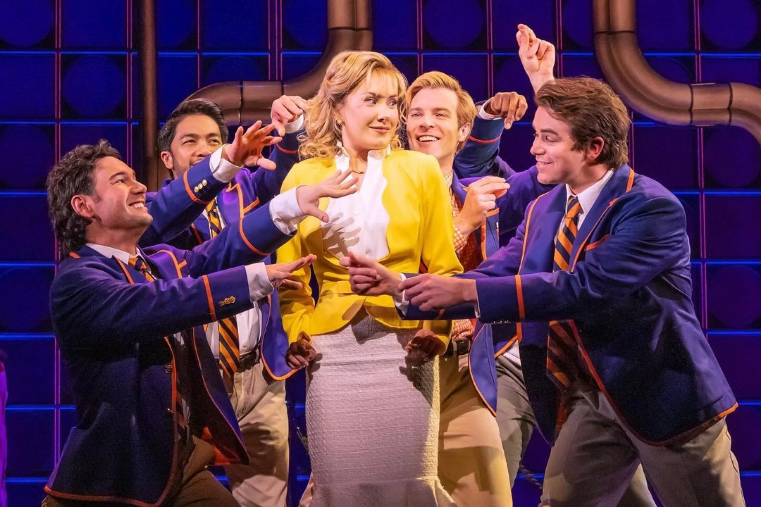 McKenzie Kurtz as Cassandra in a scene with the cast of Heart of Rock and Roll on Broadway