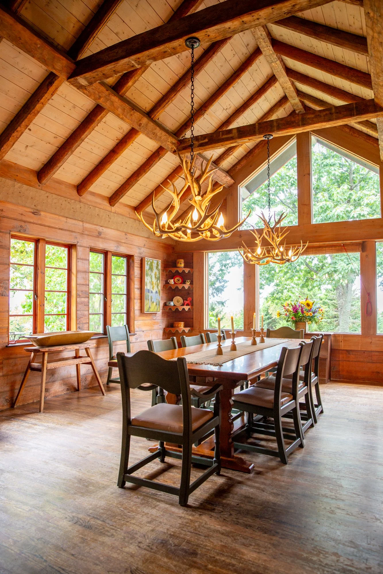 high-head-brooklin-maine-dining-room-long-table-exposed-beams-garden-view.jpg