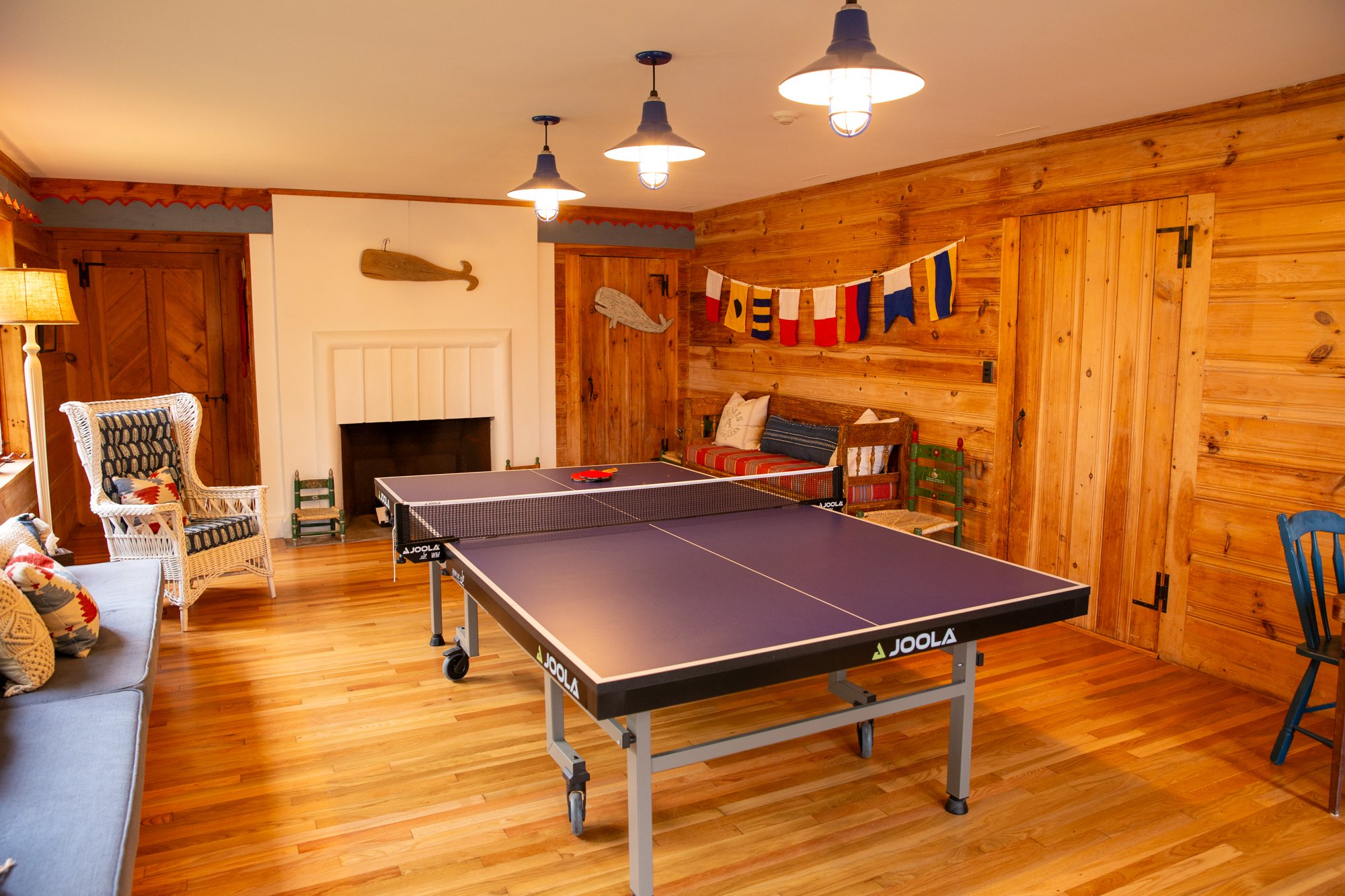 high-head-brooklin-maine-game-room-ping-pong-table-fireplace-nautical-decor.jpg