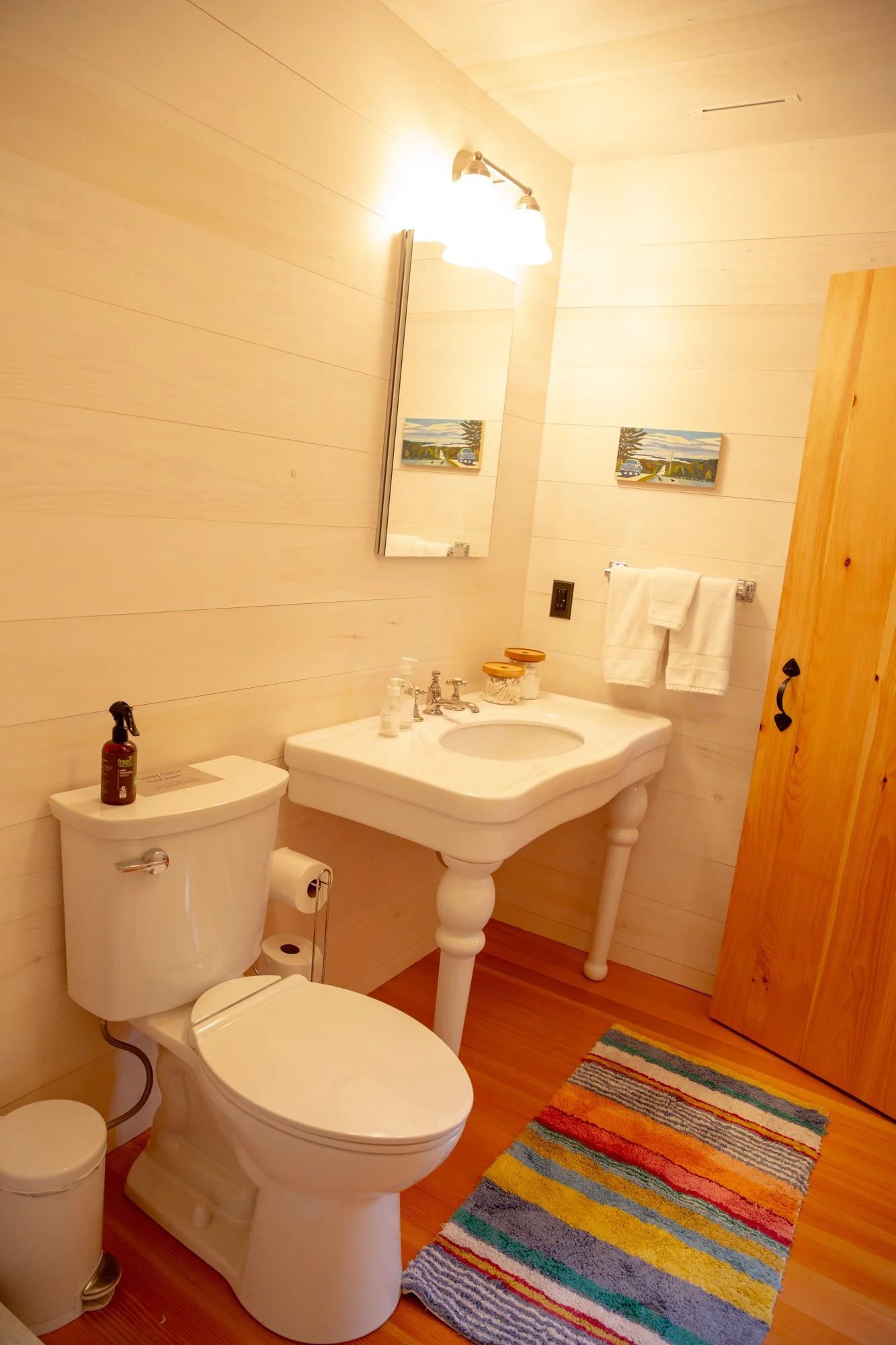 high-head-brooklin-maine-half-bath-pedestal-sink-shiplap-walls-coastal-art.jpg