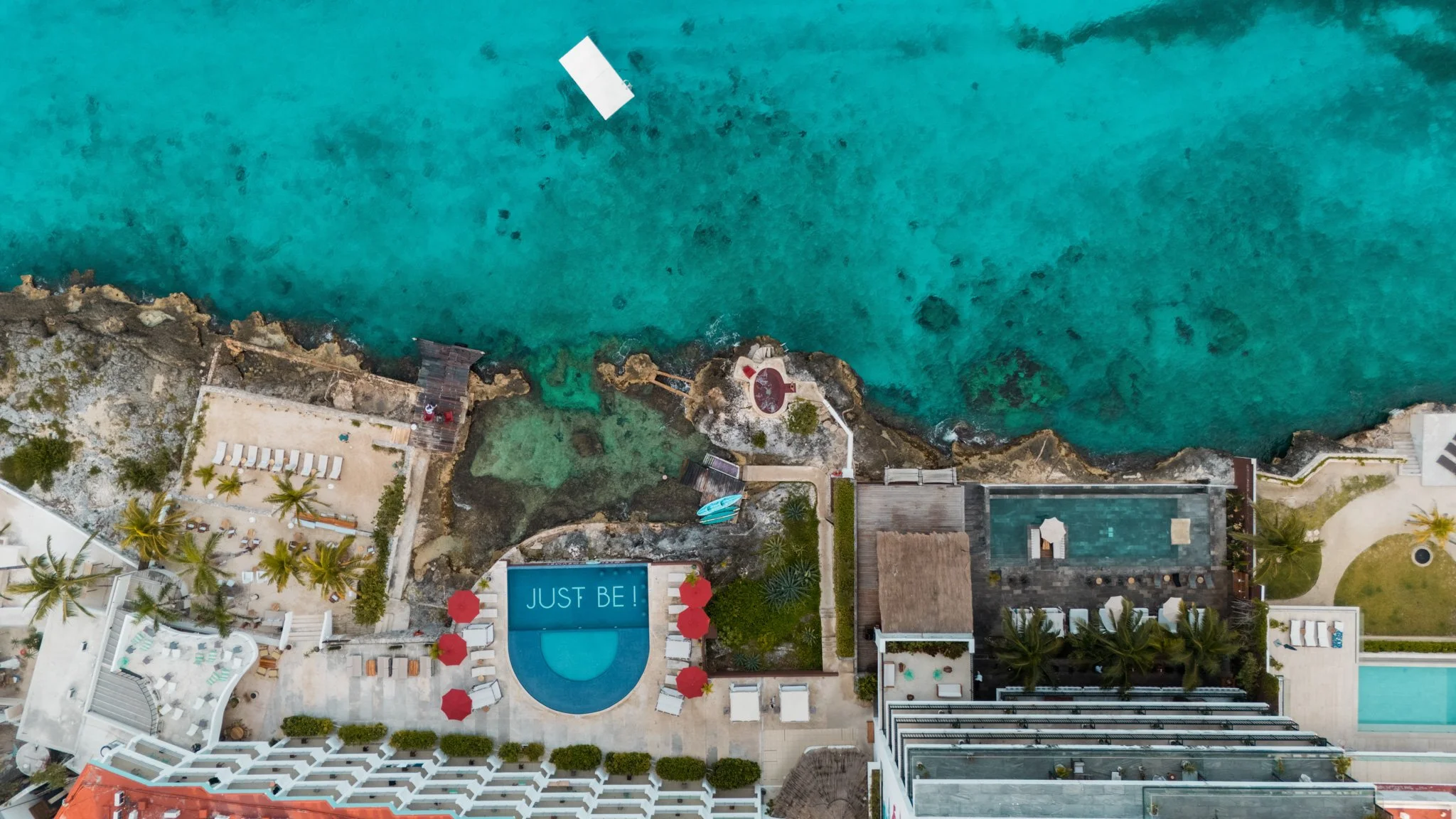 Aerial ocean front swim hotel