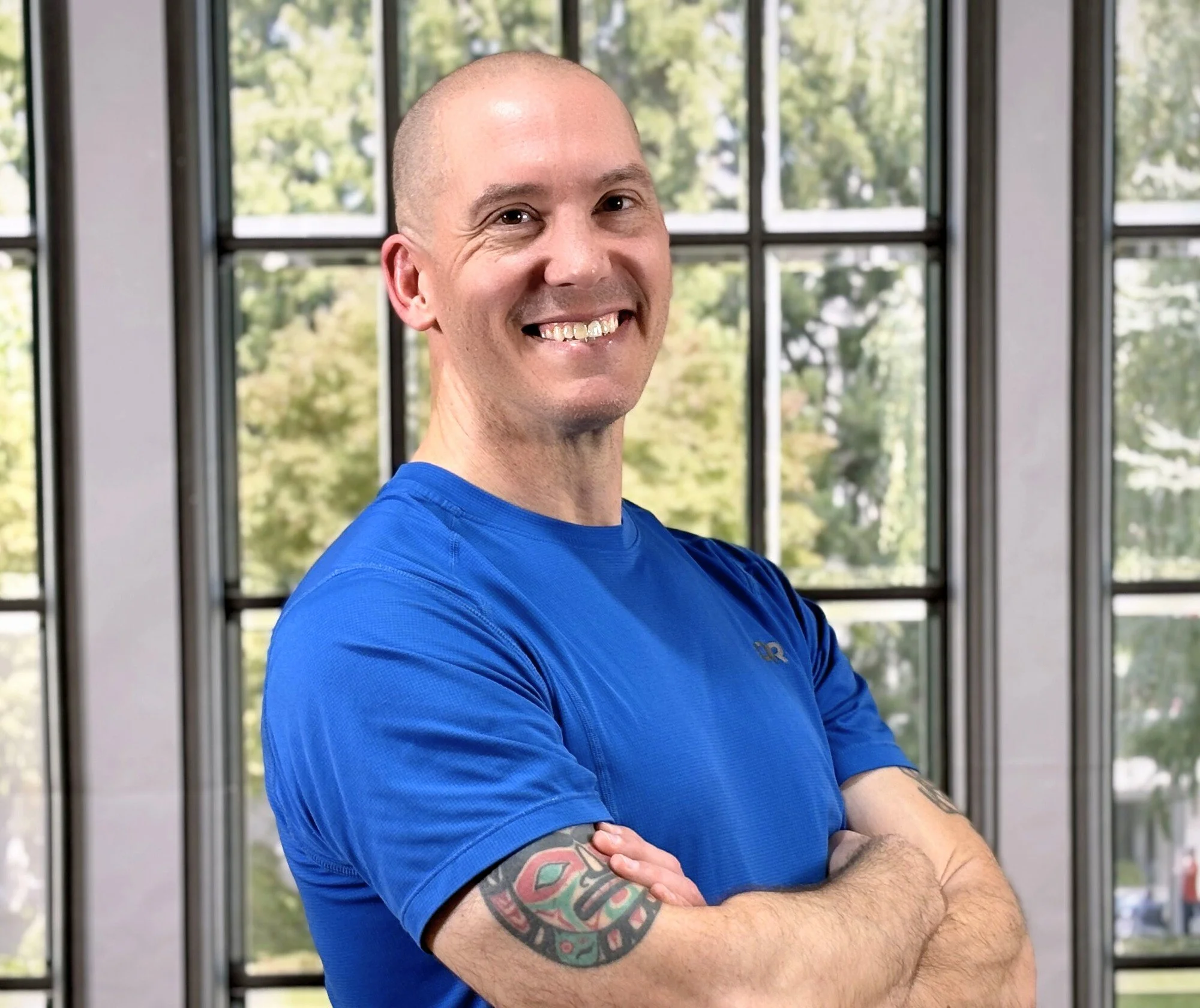 Shane Stapleton, certified HIIT instructor and founder of Beginner HIIT Pilates virtual fitness classes