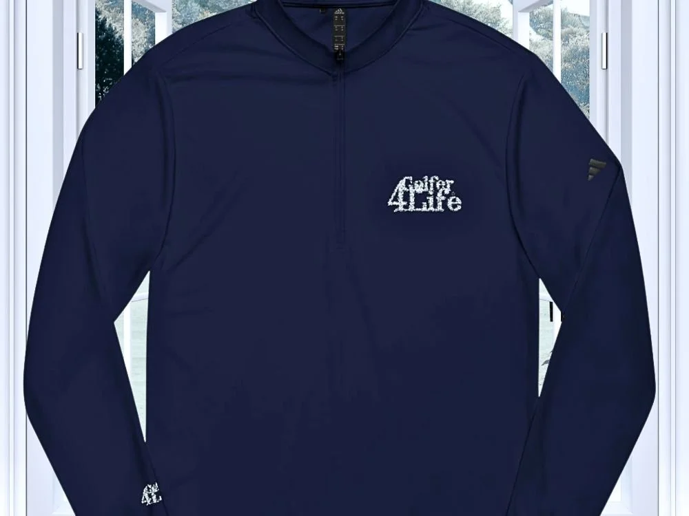 A navy blue long sleeve athletic shirt with a small Logo on the chest that says "Golfer 4 Life" and a logo on the left sleeve.