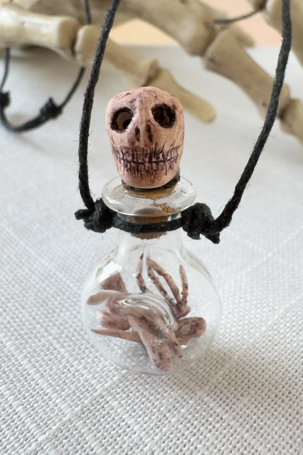 Halloween-bones-bottle-necklace-detailjpg.jpg