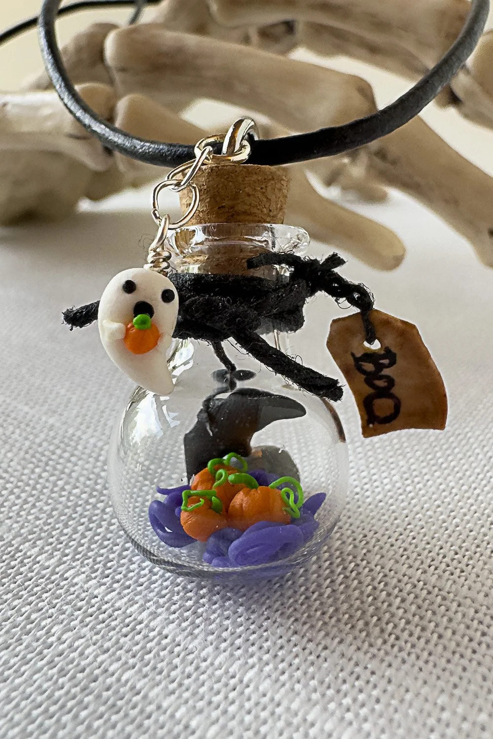 Halloween-pumpkin-patch-bat-bottle-necklace-detail.jpg