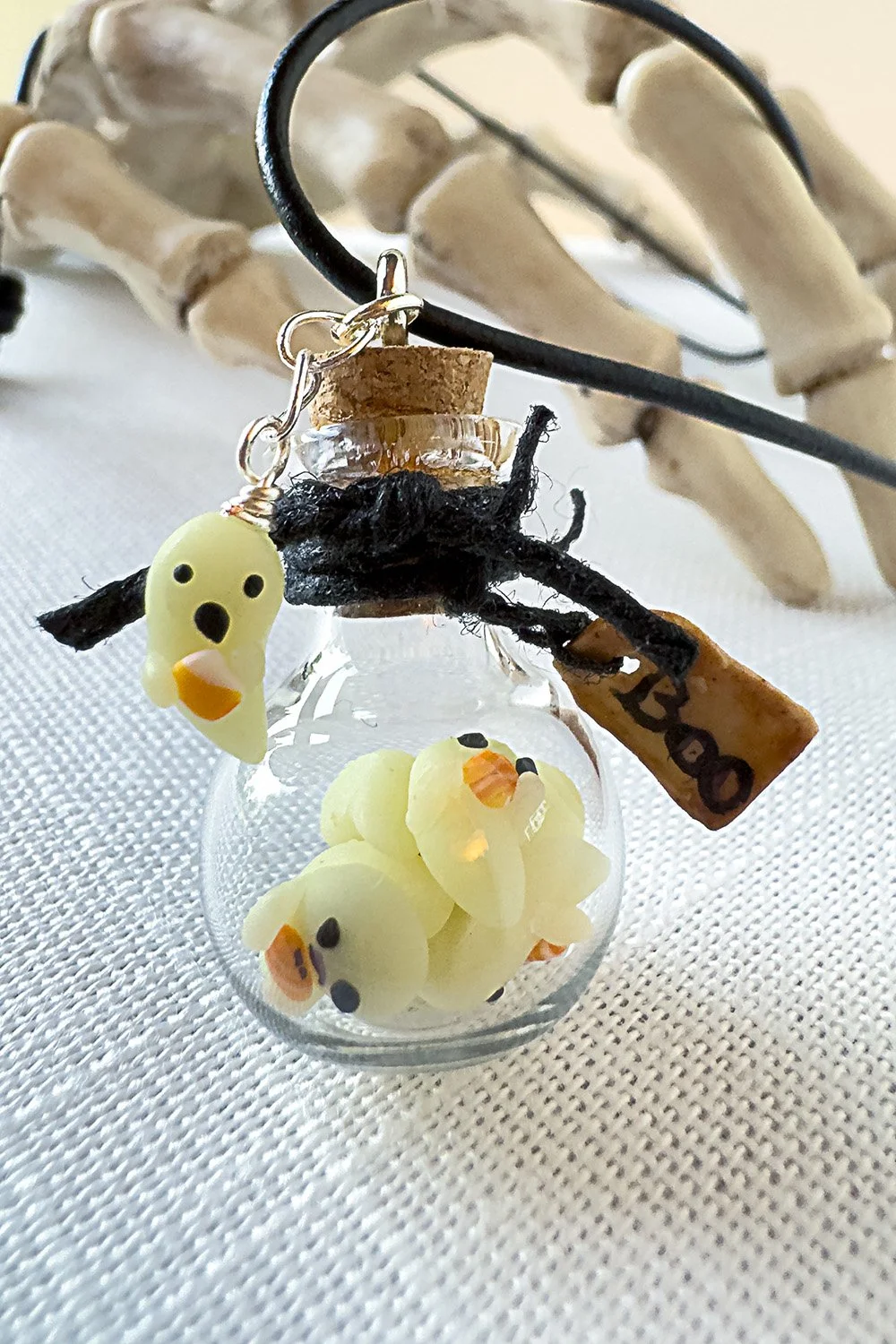 Halloween-pumpkin-glow-in-the-dark-ghost-bottle-necklace-detail.jpg