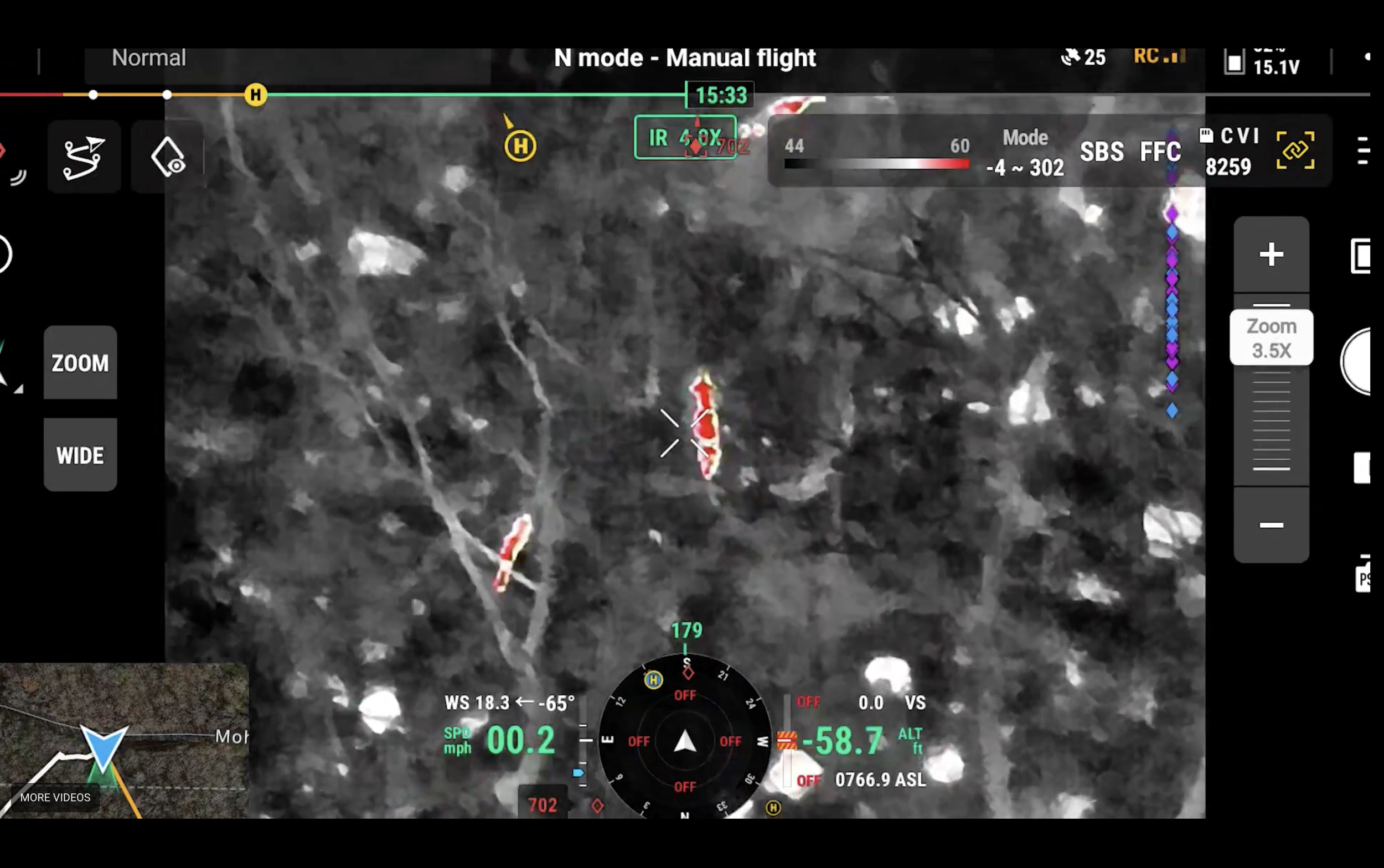 A thermal imaging view of a forested area captured from a drone screen. The image shows trees and branches in grayscale with some highlighted areas in red. The drone's flight info indicates manual mode, low altitude, and slow speed. Various flight parameters and controls are visible on the screen.