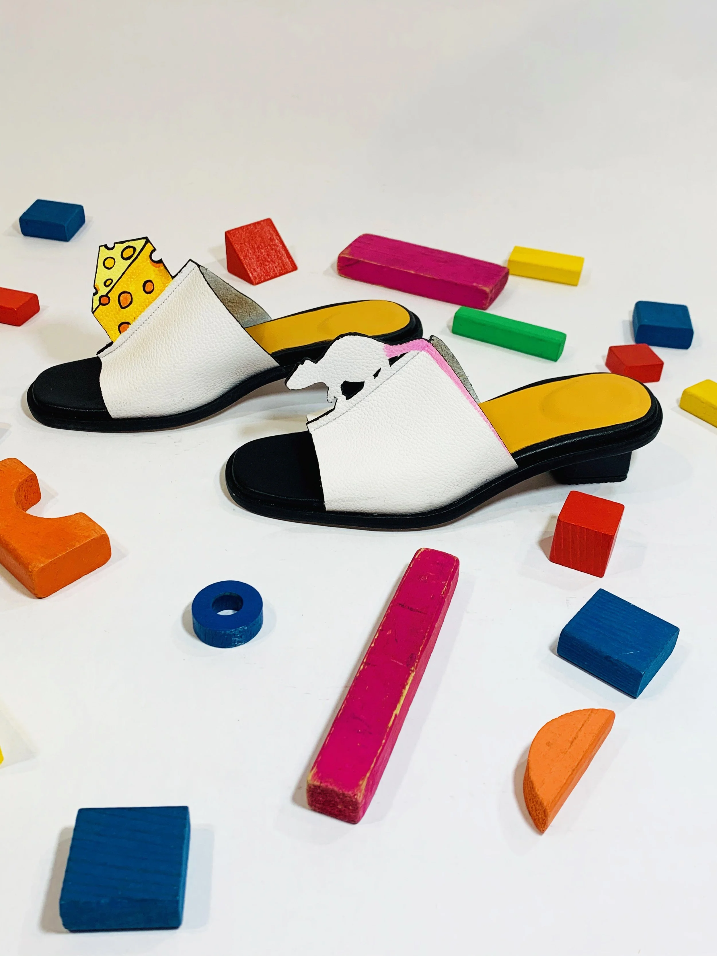 Mouse & Cheese Slides -
Playful footwear concept exploring storytelling through form and character.