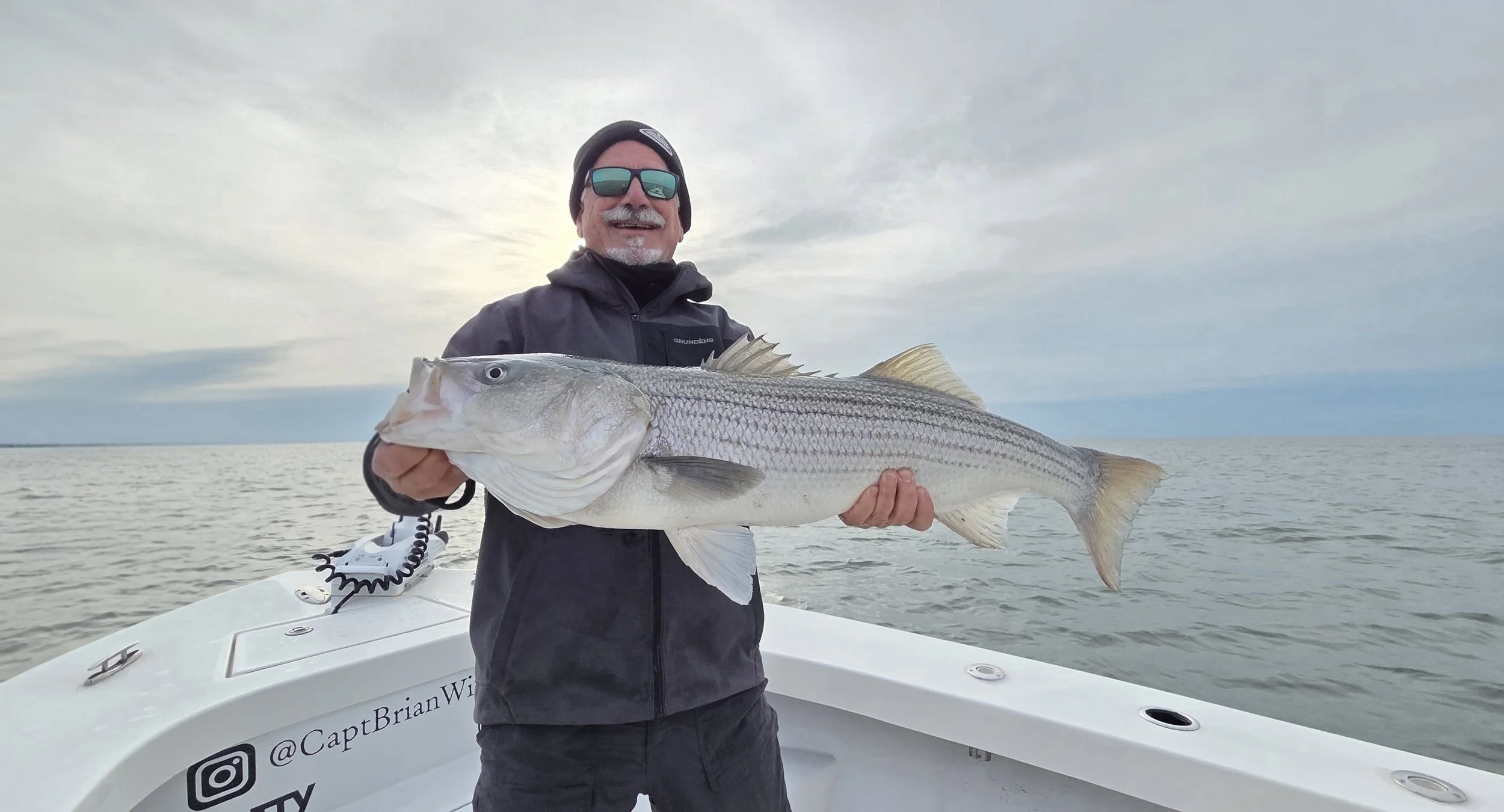 Striped bass caught on back bay fishing charter Ocean City NJ