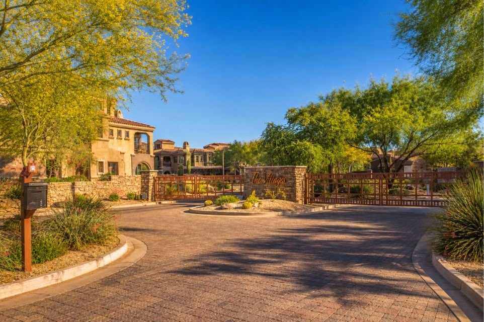 Gated townhome community at The Villages at Aviano, Desert Ridge, Phoenix. Wolfe Luxury, The Agency.