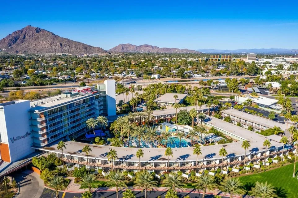 Aerial view of Hotel Valley Ho in Old Town Scottsdale with Camelback Mountain and the surrounding Scottsdale skyline.