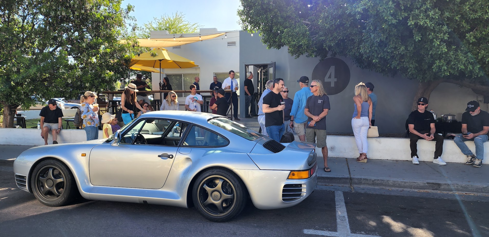 Porsche 959 parked outside Fourtillfour during a Cars and Coffee meet in Old Town Scottsdale